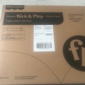 *brand new* fisher-Price deluxe kick and play piano gym.